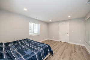 Bedroom featuring recessed lighting and light wood-style floors