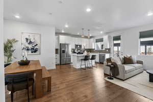 Main Living area with engineering hardwood floors and recessed lighting