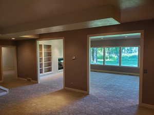 Hall featuring carpet floors and recessed lighting