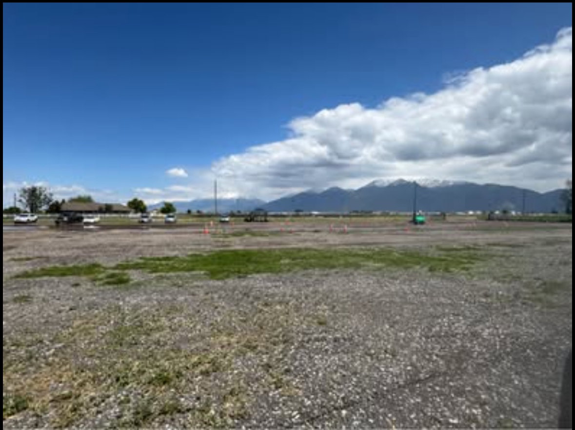 View of yard featuring a view of countryside and a mountain view