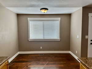 Dining area with plenty of light and view of the yard