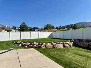 View of completely fenced backyard