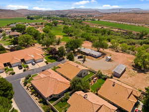 Aerial view of residential area featuring a mountain backdrop