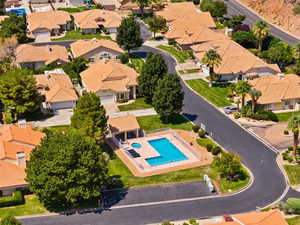 Aerial perspective of suburban area featuring a pool area