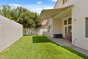 View of yard with a patio
