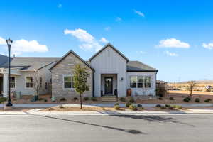 View of front of property featuring board and batten siding