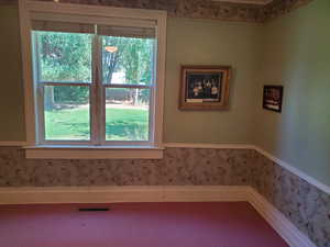 Detailed view of wallpapered walls