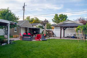 View of yard with a patio area and a gazebo