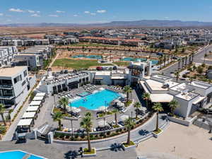 Bird's eye view of a pool and a mountain backdrop