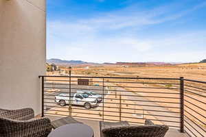 Balcony with a mountain view and a view of countryside