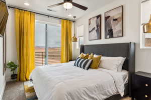 Bedroom featuring carpet, a ceiling fan, and recessed lighting