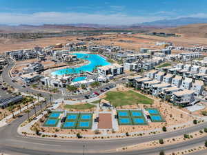 View of lagoon, pool, and pickleball courts