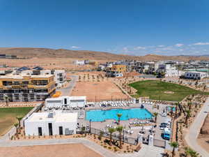 Drone / aerial view of a pool and mountains