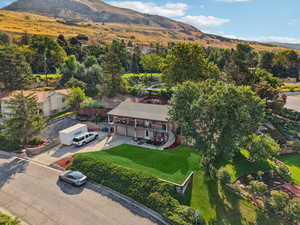 View of subject property featuring a mountainous background
