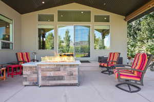 View of patio / terrace featuring an outdoor fire pit