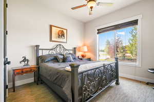 Bedroom featuring carpet flooring and a ceiling fan