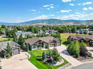 Aerial perspective of suburban area featuring mountains