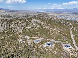 Aerial view of sparsely populated area featuring a mountainous background