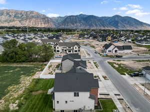 Aerial view of residential area featuring mountains