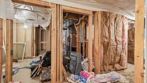 Miscellaneous room with electric panel and heating unit