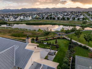 Aerial view of residential area with a water and mountain view