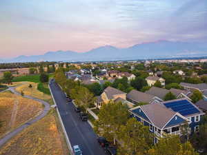 Aerial view at dusk of a mountain view and a residential view