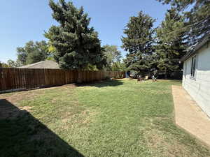 View of fenced backyard