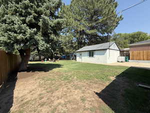 View of fenced backyard