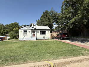 View of front of home with a chimney