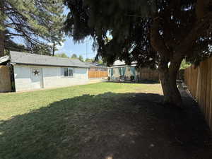 Fenced backyard featuring a patio area