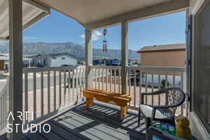 Balcony with a mountain view and a residential view