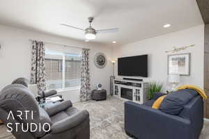 Living area featuring recessed lighting and ceiling fan