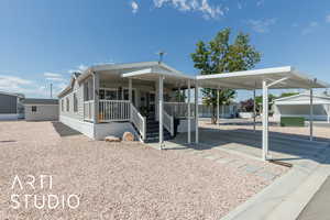 Manufactured / mobile home featuring covered porch