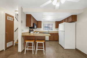 Kitchen featuring a breakfast bar