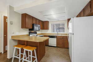 Kitchen featuring a breakfast bar
