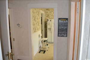 Corridor with wallpapered walls