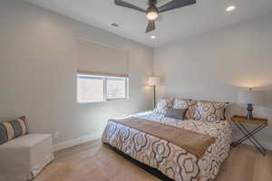 Bedroom featuring wood finished floors, recessed lighting, and a ceiling fan