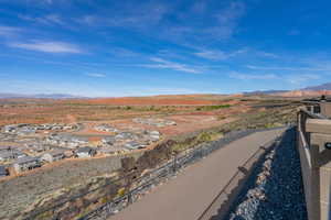Aerial perspective of suburban area with a mountainous background