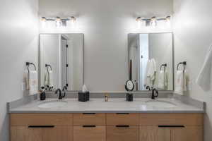 Full bathroom with double vanity