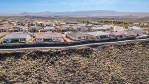 Aerial view of residential area with a mountain backdrop