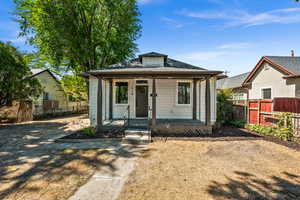 Bungalow featuring covered porch