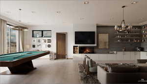 Playroom featuring billiards, suspended lighting, light wood-style floors, and a fireplace