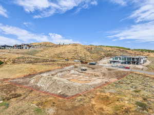 Aerial view of property and surrounding area featuring property parcel outlined