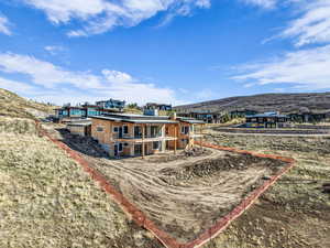 Back of house with a mountain view
