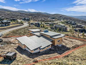 Aerial view of residential area with a mountainous background