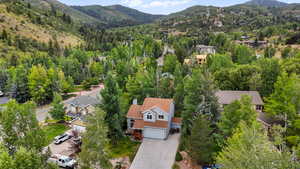 Aerial perspective of suburban area featuring mountains
