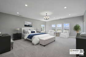 Bedroom featuring light colored carpet, recessed lighting, and a chandelier