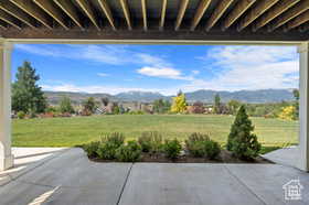 View of patio / terrace with a mountain view