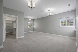 Upstairs bedroom, walk-in closet, faces east. One of the additional 4 bedrooms with home total of 7 bedrooms