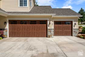 Garage with concrete driveway